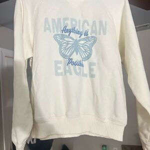 American Eagle Cream Pullover with Blue Graphic-
Worn one time